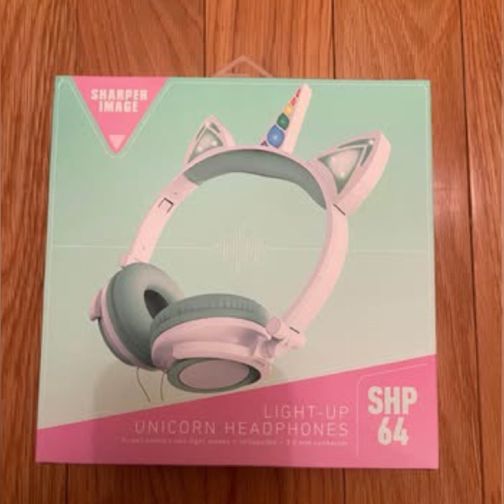 New in box Sharper Image Light-Up Unicorn Headphones